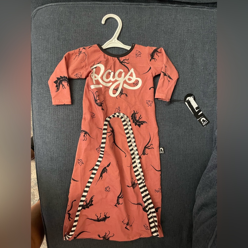 0-3 month Rags Pouch. Color is kind of burnt orange or terracotta